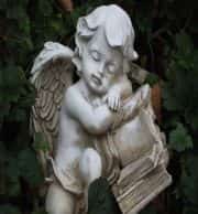 Angel Readings in Glasgow or receive personal Angel Messages in Charlottetown PE Canada for answers, insights and clarity, sleeping angel on open book